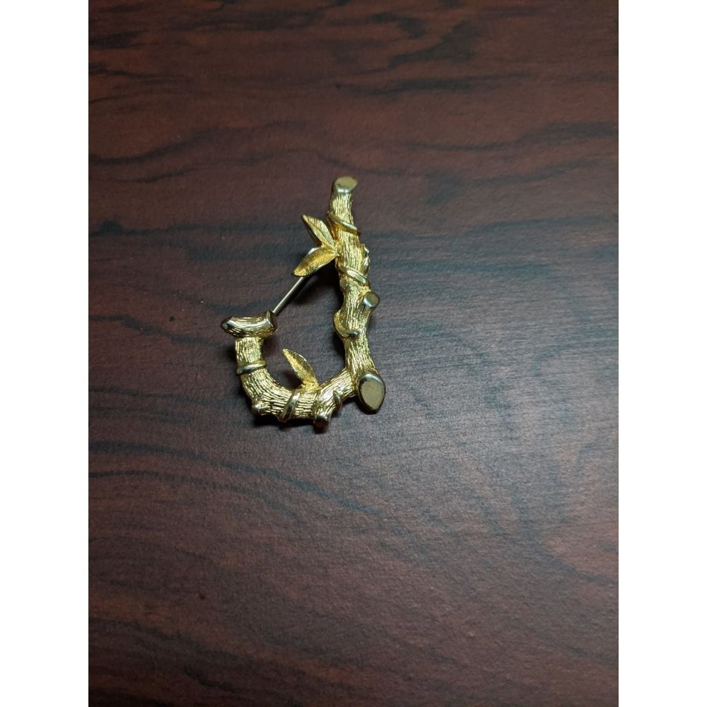 J lapel pin